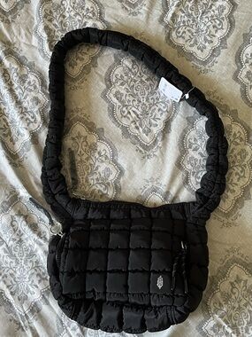 FP Movement Quilted Baby Carryall Sling Bag